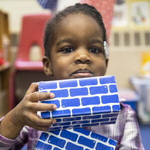 preschool child with blocks